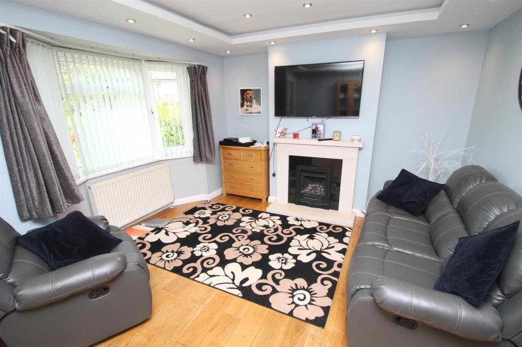 Lot: 49 - WELL PRESENTED SEMI-DETACHED HOUSE - Living room with bay window